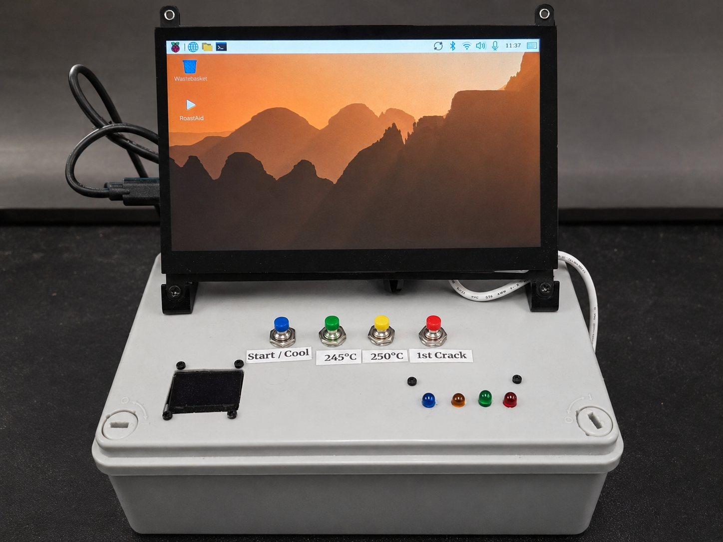 Physical RoastAid prototype with touchscreen, labelled event buttons and indicator LEDs